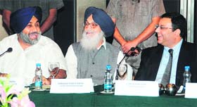 From left: Deputy Chief Minister Sukhbir Badal and Chief Minister Parkash Singh Badal at an interaction with Tata  Group chairman Cyrus Mistry, in a file photo