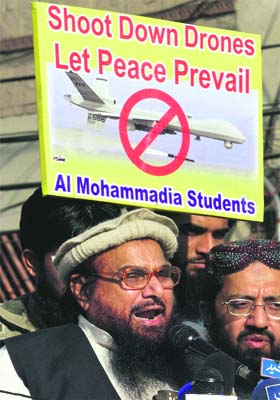 Jamaat-ud-Dawa head and 26/11 mastermind Hafiz Saeed addresses an anti-US rally in Lahore on Friday