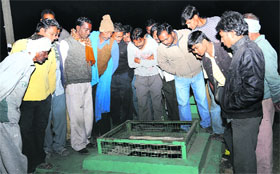 People gather at the mishap site in Madanpur, Mohali, on Sunday. 