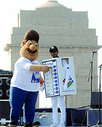 A mascot of the Election Commission, Mr. Votu, creates awareness among voters during the Voice of Vote Concert at India Gate in New Delhi on Sunday