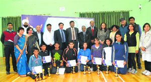 Winning teams of DPS Sonepat and RK Puram at the presentation ceremony of the Inter Delhi Public School Badminton Championship at DPS Ranipur in Haridwar on Sunday.