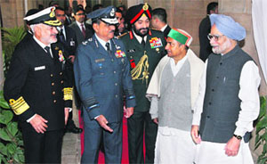 Prime Minister Manmohan Singh with the Defence Minister AK Antony and the three service chiefs during the Combined Commanders Conference in New Delhi in November