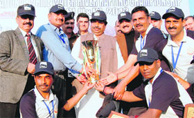 BSF team with their trophy in Reasi on Sunday.