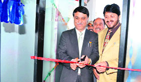 Muhammad Latif Mir, Deputy General Manager, PNB, inaugurates an ATM at Shamachak in Jammu on Sunday.
