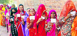 Women queue up to vote for the Assembly election in Jodhpur on Sunday
