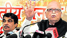 BJP leaders LK Advani and Nitin Gadkari address a press conference in New Delhi on Sunday
