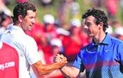 Adam Scott congratulates Rory McIlroy after the latter won the Australian Open on Sunday. 