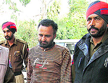 Rakesh Kumar, who had enacted his abduction drama, being produced in court by the Jalandhar police on Monday