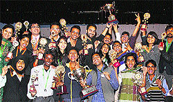 Students of Lovely Professional University in a jubilant mood after winning Overall Runners-up Trophy of AIUs North Zone Inter-University Youth Festival near Jalandhar on Monday