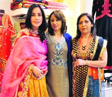 Fashion fabric: Rupam Grewal (centre) with her clients