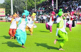 Students perform bhangra during the closing ceremony of the National School Games in Bathinda on Tuesday