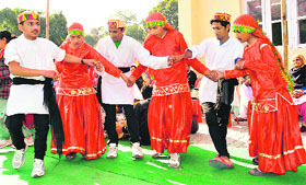 Differently abled artistes perform a dance to mark International Day for Persons with Disabilities at Dharamsala on Tuesday.