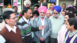 Municipal Commissioner Manpreet Chhatwal takes stock of the situation at Railway Road in Jalandhar on Tuesday.