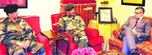 GOC-in-C of the Western Command Lt Gen Philip Campose (centre) with Chief Minister Omar Abdullah during a meeting in Jammu on Tuesday.