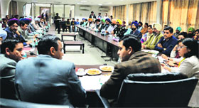 DC Rajat Aggarwal holds a meeting with officials in Ludhiana on Tuesday.