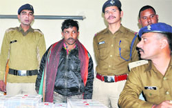 A notorious thief who was arrested by the police in Dehradun on Wednesday. A Tribune photograph