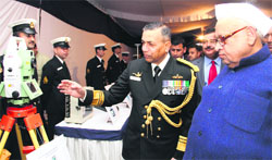 Governor Aziz Qureshi being brifed about naval equipment at a function held in Dehradun on Wednesday. A Tribune photograph