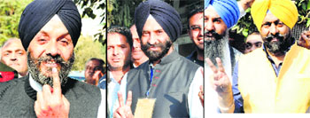(From left): Manjit Singh GK, Manjinder Singh Sirsa and Harmit Singh Kalka after casting their vote in New Delhi on Wednesday.