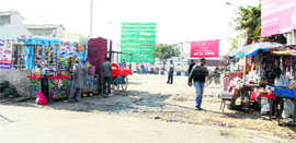 Kiosks selling tobacco products close to the boundary wall of the Bathinda railway junction on Thursday.