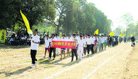 Students take out march past during the opening ceremony of the Idea Junior Championship League-2013 at Giani Zail Singh PTU Campus in Bathinda on Thursday.