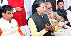 State BJP president Ram Bilas Sharma addresses mediapersons in Rohtak on Thursday