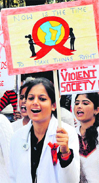 Students of Dronacharya BED College take out an anti-AIDS rally at Rait, near Dharamsala, on Wednesday.