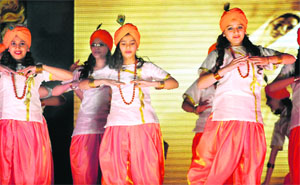 Students of Cambridge International School perform a cultural programme in Jalandhar on Thursday.