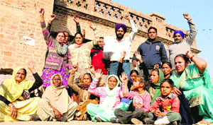 Residents of Talwandi Bharo village protest against the lack of teachers at Government Primary School in the village.
