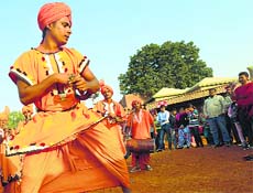A snake charmer weaves his magic