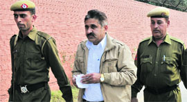 Ram Kumar Chaudhary, the prime accused in the Jyoti murder case, being produced in the District Courts in Panchkula on Friday.