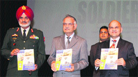 Lt Gen TS Gill, Shivraj V Patil, UT Administrator and KK Sharma, Adviser to the UT Administrator, at an Armed Forces Flag Day function at the Tagore Theatre in Chandigarh.