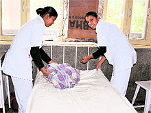 Nurses make up a bed at the Civil Hospital in Bathinda on Saturday