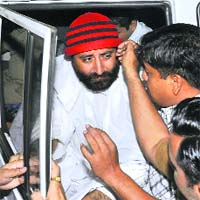 Narayan Sai, son of Asaram Bapu, being taken for a medical test at Surat Civil Hospital on Saturday
