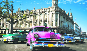 One can see many old Chevrolets, Fords and Cadillacs on the streets and roads of Havana