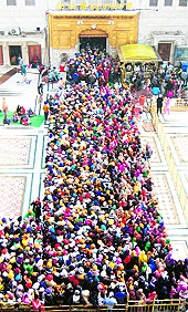 Devotees pay obeisance at the Golden Temple in Amritsar on Sunday