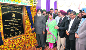 Punjab Chief Minister Parkash Singh Badal lays a foundation stone of a special school in Bathinda on Sunday.