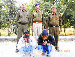 The rape accused 'tantriks' in police custody.