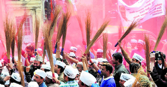 AAP supporters hail partys stunning performance in the Delhi Assembly polls on Sunday.