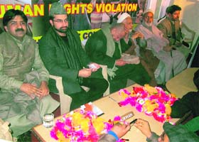 Hilal War (L) and Mirwaiz Umar Farooq at a seminar on human rights in Srinagar on Sunday