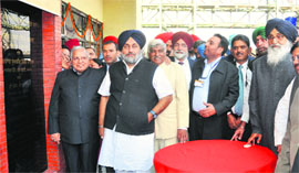 Chief Minister PS Badal (right), Deputy CM Sukhbir Badal and state ministers at the inaugural function at Nalas village near Rajpura on Sunday.