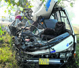 The mini bus which collided with a truck near Bagrian village on the Patiala-Sirhind road on Sunday.