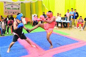 Players in action during the District Wushu Championship in Bathinda on Monday