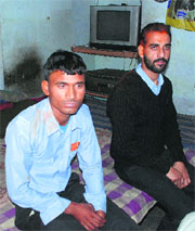Two cash delivery officials who were present in the vehicle when it was looted