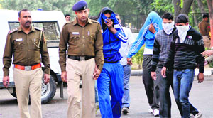 The accused in police custody. 