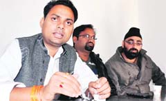 Uttarakhand Youth Congress state president Bhuvan Kapri addresses mediapersons in Dehradun on Monday. A Tribune photograph