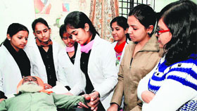 A patient being examined at the physiotherapy awareness camp at St Soldier Degree College in Jalandhar on Monday.