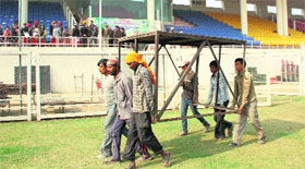 Work in progress at the Guru Gobind Singh Stadium ahead of the women's final match of the World Cup Kabaddi in Jalandhar on Monday.