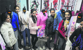 Students of the Sportking Institute of Fashion Technology showcase their designs at the institute in Ludhiana on Monday.