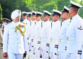 Rear Admiral BS Parhar, Flag Officer Naval Aviation, Goa, reviews the passing-out parade of helicopter pilots near Chennai on Monday