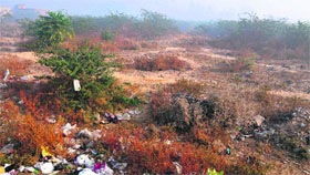 the proposed site for the new bus stand on Barnala road. 